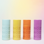 Load image into Gallery viewer, Front view of NÖZ four package colors of sunscreen aligned
