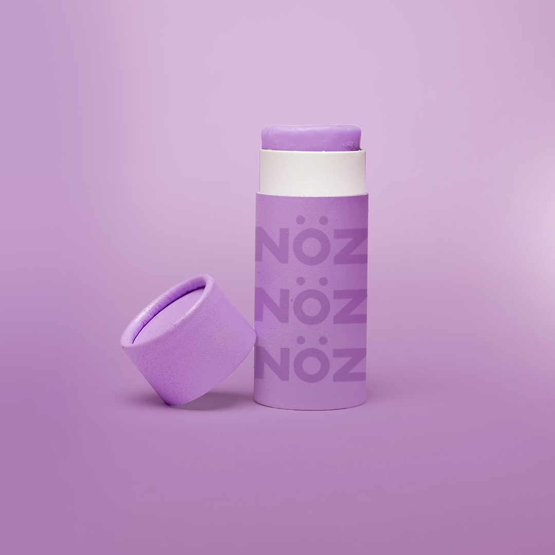 Front view of NÖZ purple sunscreen open package