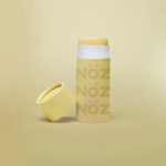 Load image into Gallery viewer, Front view of NÖZ yellow sunscreen open package
